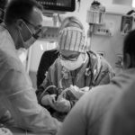 anesthesiologist intubates a patient