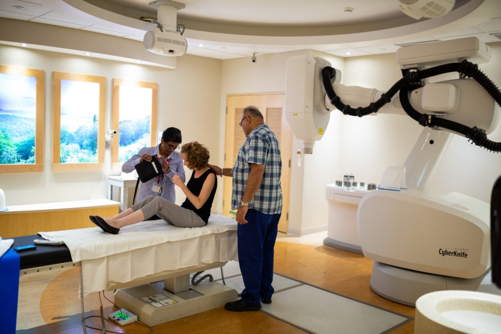 Radiation Therapists prepare patient for treatment
