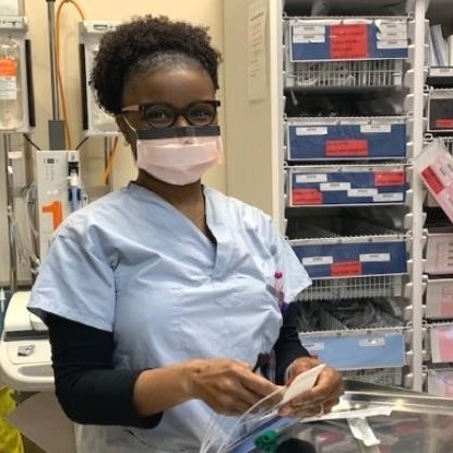 Nurse Camille Marshall works in the ER wearing a mask