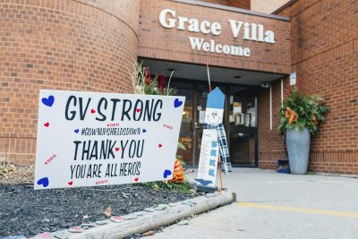 Thank you sign to healthcare workers outside of Grace Villa