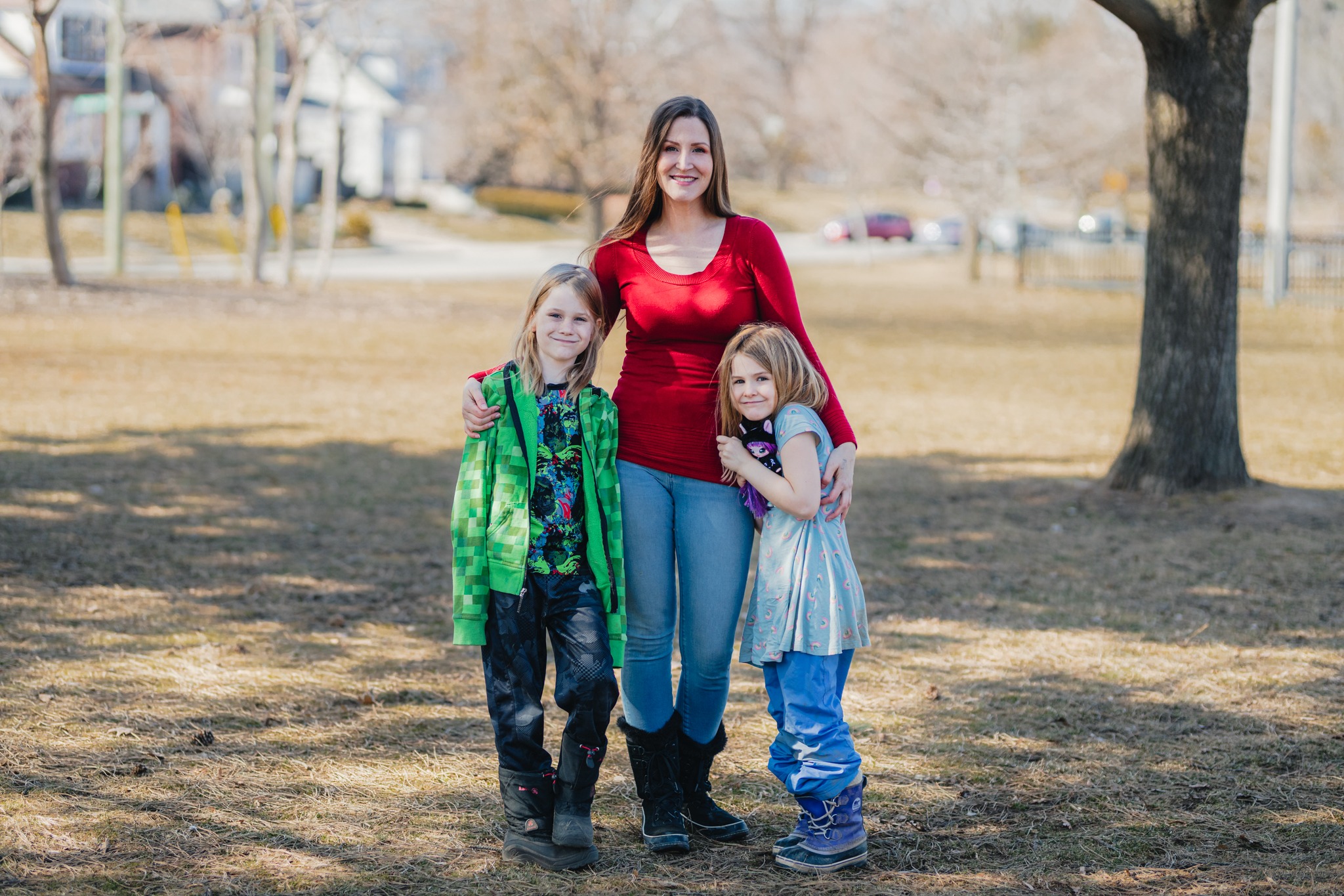 Shondra in a park with her children