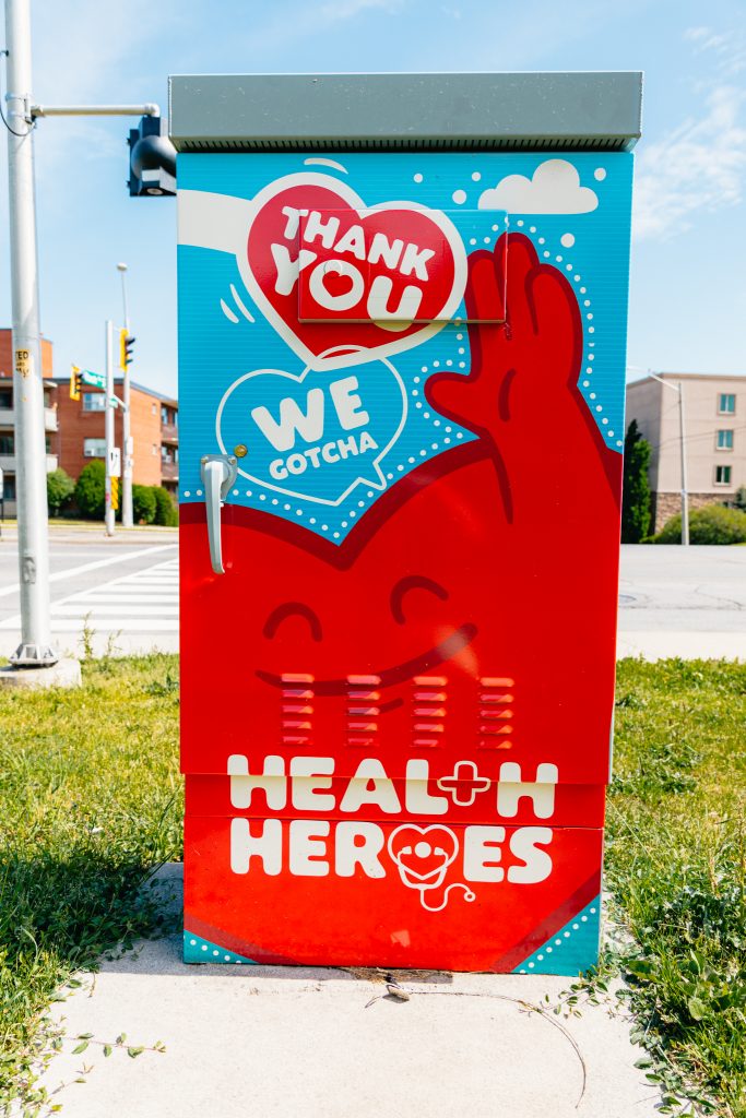 Traffic signal box that has an art wrap honouring healthcare workers