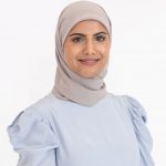 Dr. Kanani, wearing a hijab