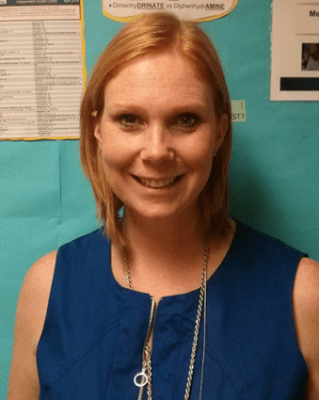 Head and shoulders photo of Jennifer Robinson, clinical manager of the fee-for-service program at HHS. She has shoulder length strawberry blonde hair and is wearing a dark blue sleeveless shirt 