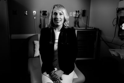 Dr. Kylie Lepic, seated, black and white photo