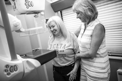 Patient Trudie Nicholls with mammography technologist Carrie Claxton