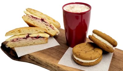 Latte, 2 cookies and a sandwich