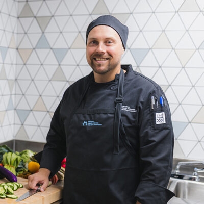 Photograph of HHSVA Chef Manager, Bogdan Kopec, at the Courytard Cafe, Hamilton General Hospital Photograph by Josh Carey, HHS