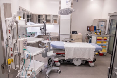 Inside the emergency department there is a bed and equipment